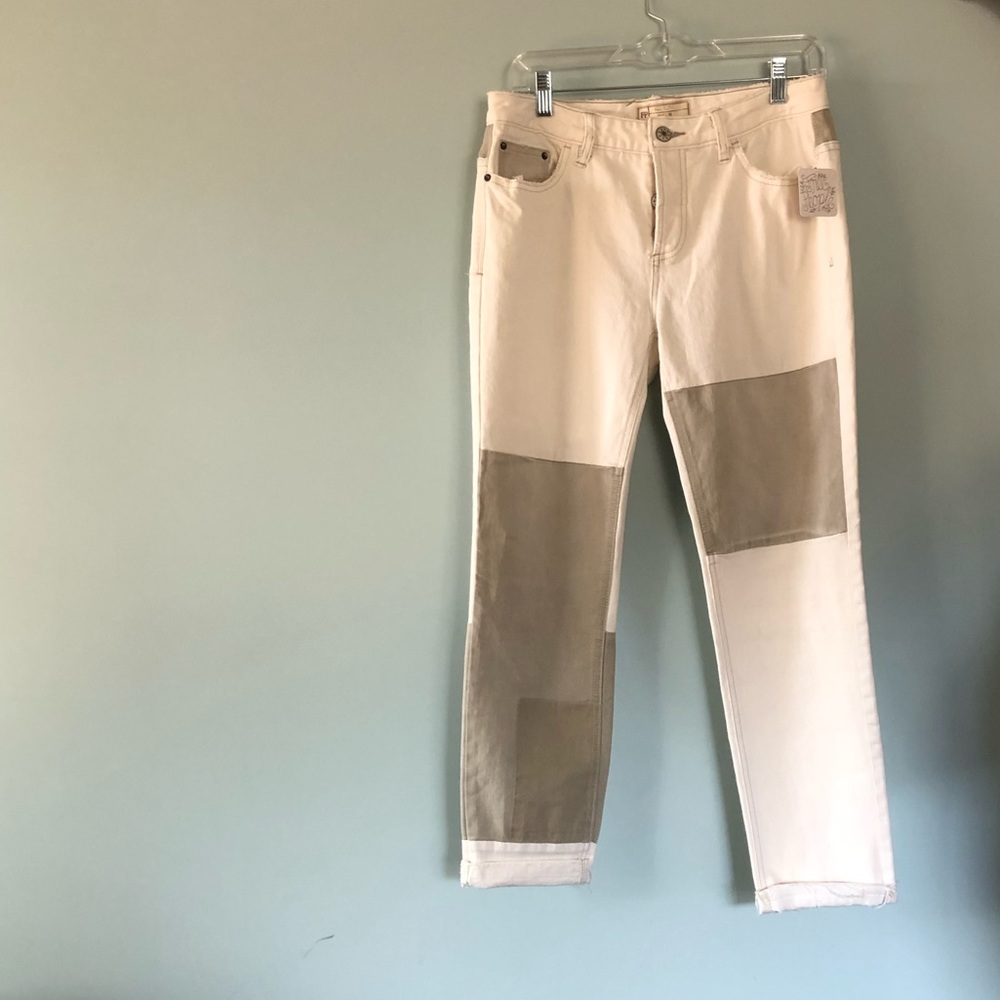 straight leg rolled cuff. Cream w/ tan patch work